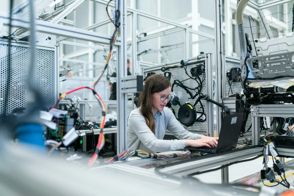 Engineer testing LED therapy circuit boards in the RTSUN factory