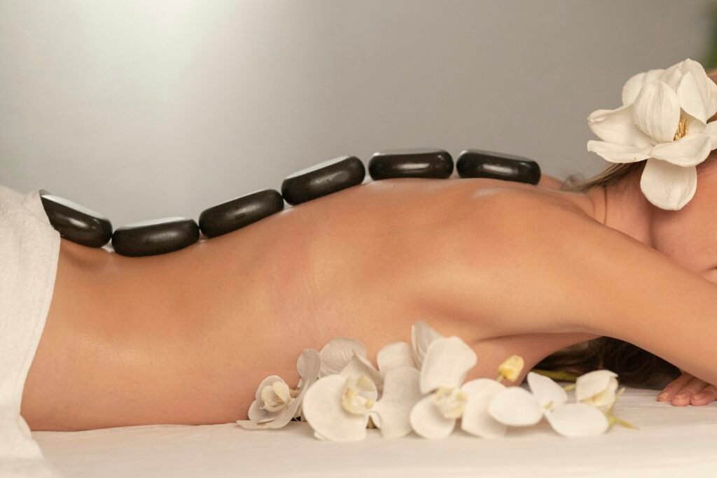 Red light shoulder and neck massage belt for a wellness brand